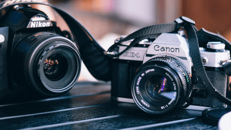 black canon and nikon cameras