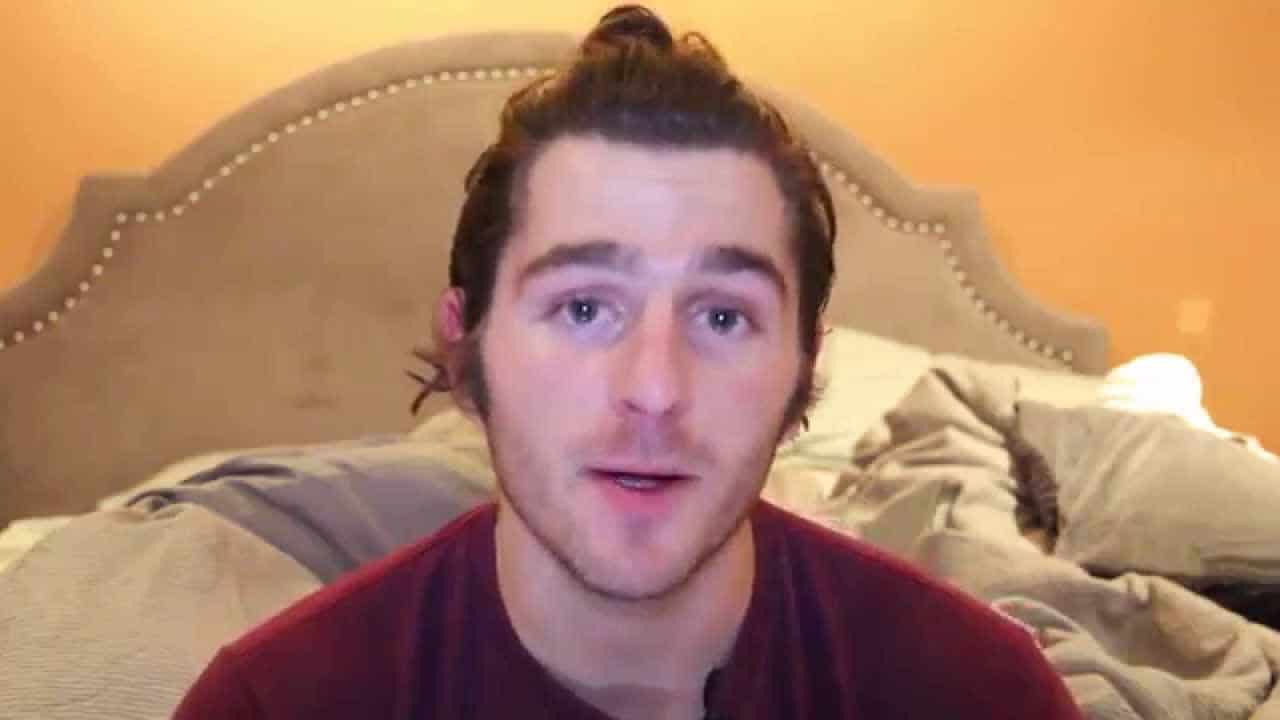 Julien Solomita speaking for the camera in his room
