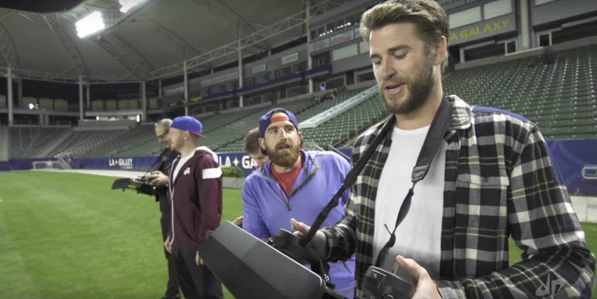 Dude Perfect holding a drone console