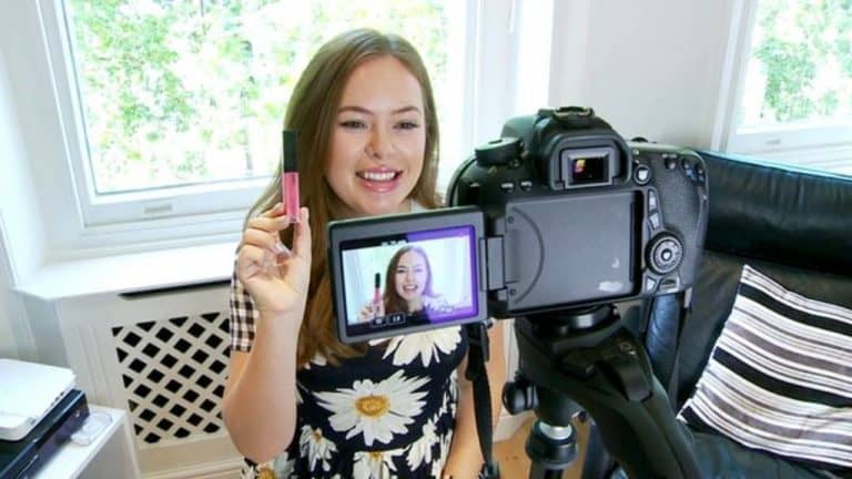 woman promoting products in front of the camera