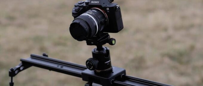 Video camera mounted on a slider for cinematic shot