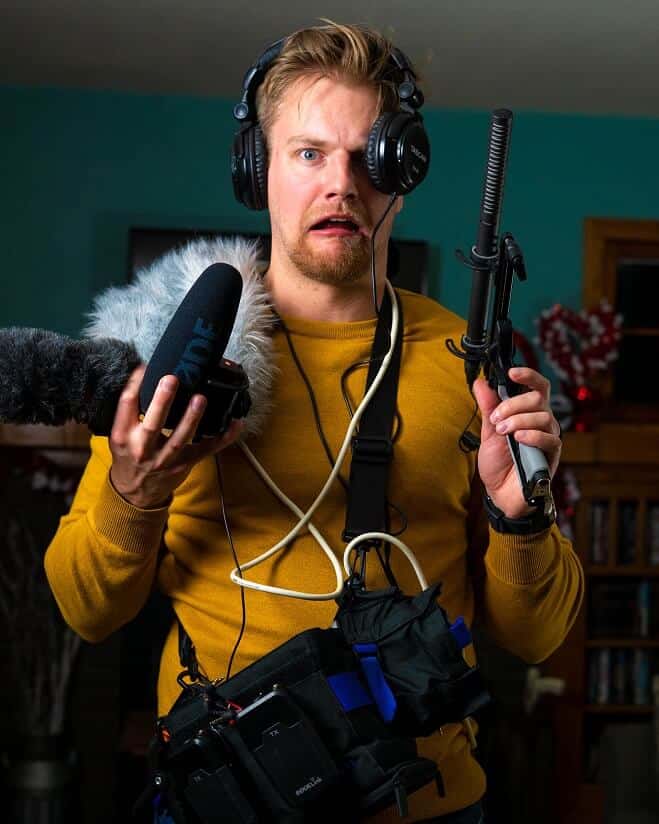 man choosing his recording equipment